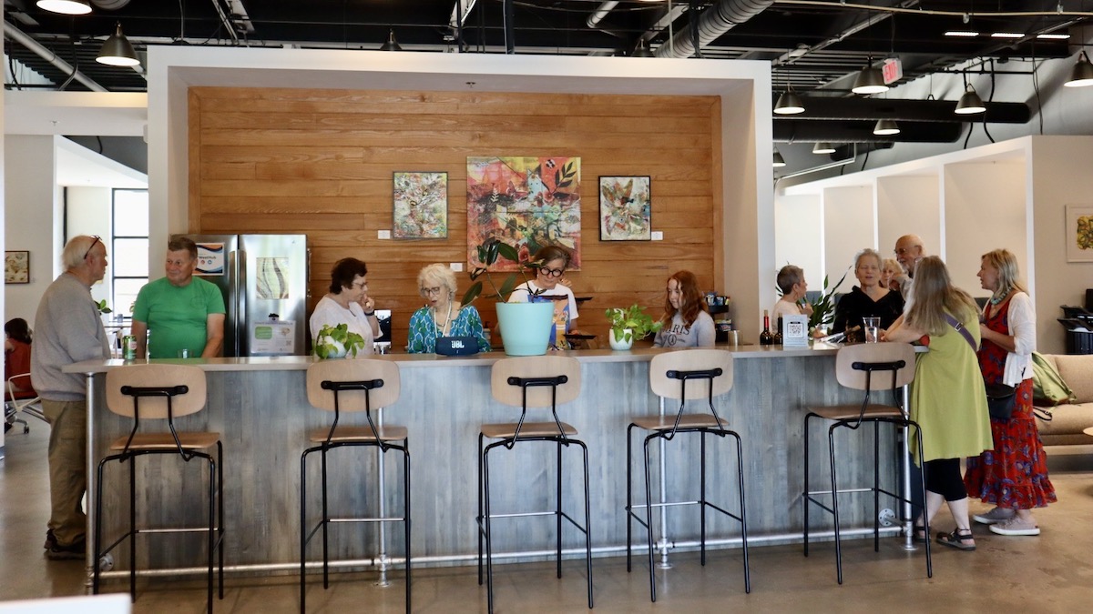 New members at 79°West hub gather for a Breakfast Club meeting.