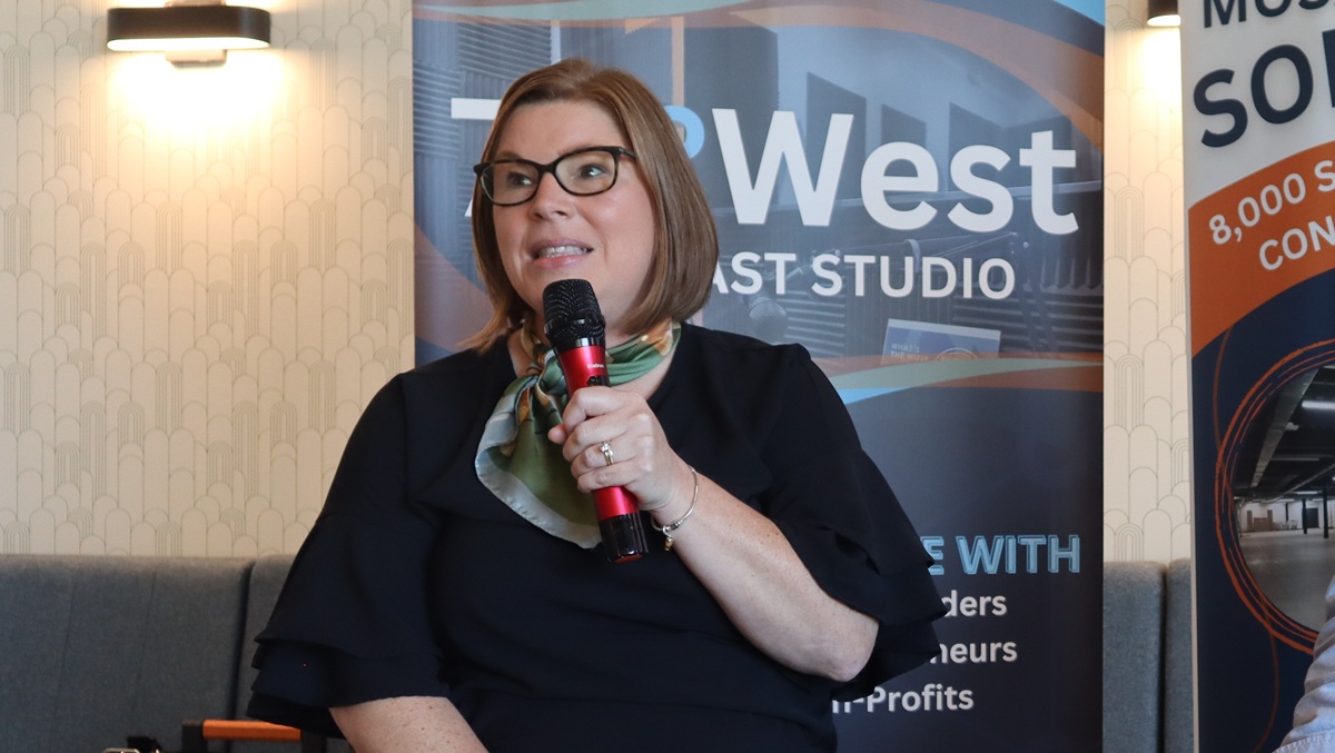 Rebecca Dickenson speaking at 79 West event
