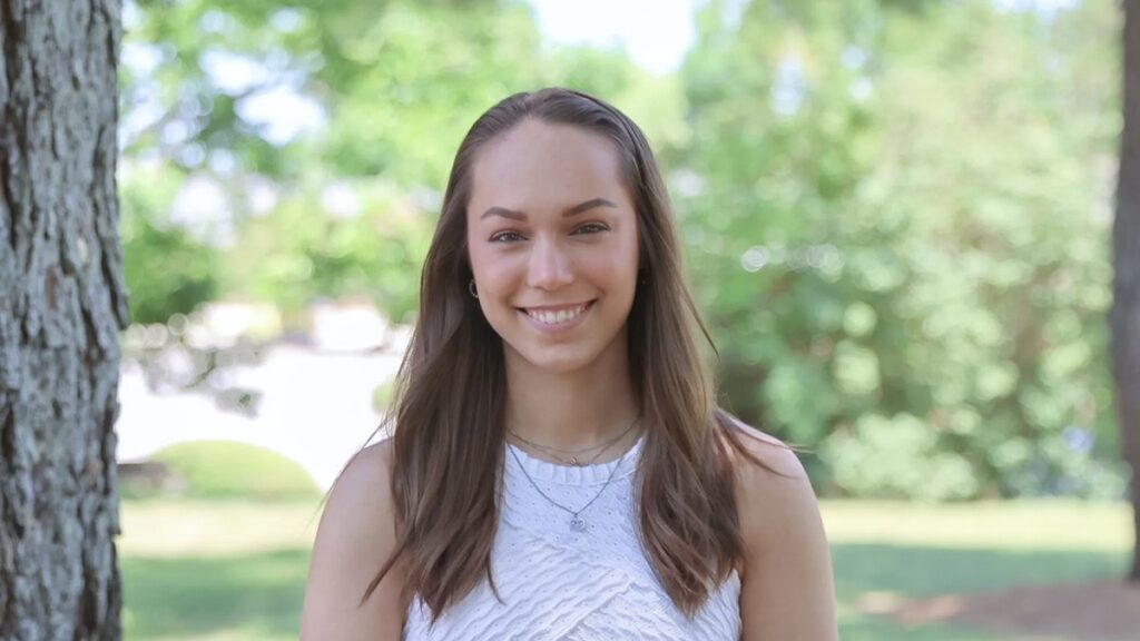 Emily Zaremba of Foundations Family Therapy smiling outside