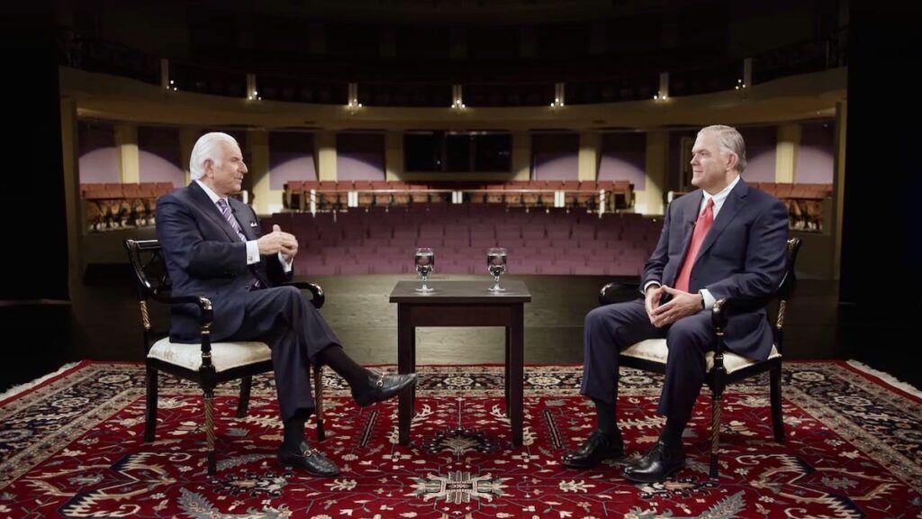 Kirk Bradley of Lee Moore Capital sitting across from Side by Side with Nido Qubein for a PBS interview.