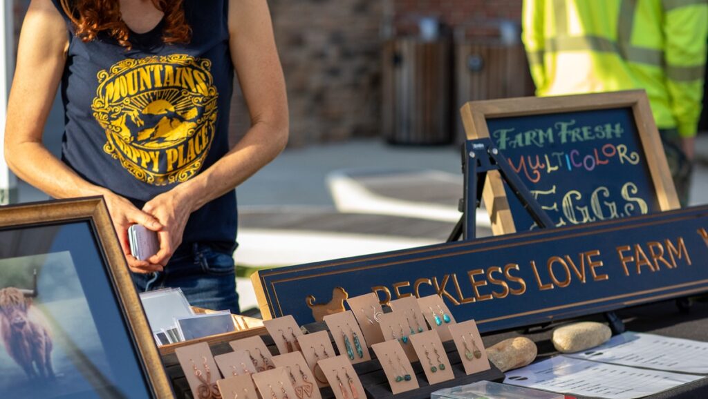 Earrings and woman at farmers market
